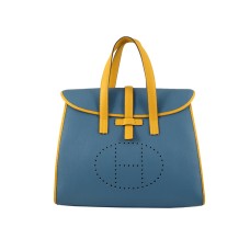 Hermès 08c Klappentasche, blau mit gelbem Lederbesatz
