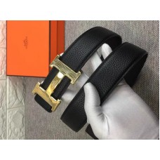 Hermes Gürtelschnalle „H“ in glänzendem Gold & Wendelederarmband, schwarz